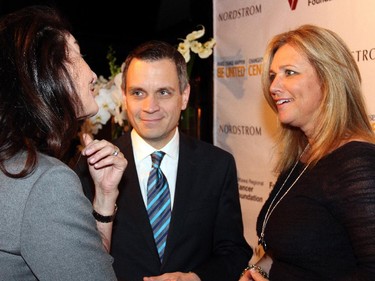 From left, Karen McKibbin, president of Nordstrom Canada, in conversation on Wednesday, November 19, 2014, at Lago Bar and Grill with Mark Sutcliffe and Mary Taggart, who are committee co-chairs of a charity gala that Nordstrom's hosting in March for United Way Ottawa and the Ottawa Regional Cancer Foundation.