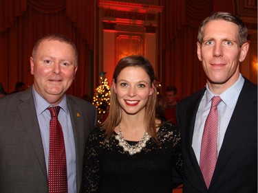 From left, Kevin Keohane, president and CEO of the CHEO Foundation, with Laurie Gillin and Chris Gillin, Gillin Engineering & Construction Ltd., at the Trees of Hope for CHEO event held at the Fairmont Chateau Laurier on Monday, November 24, 2014.