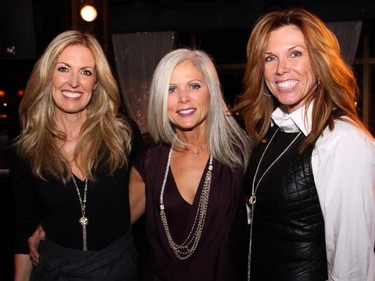 From left, Melissa Shabinsky, a gala committee member, with Lynn Shabinsky and Catherine Whitla, also a gala committee member, at a reception held Wednesday, November 19, 2014.