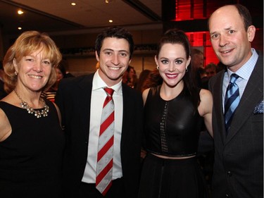 From left, organizer and former Olympic athlete Sue Holloway with Canada's ice-dancing gold and silver medalists, Scott Moir and Tessa Virtue, and Chris Klotz, co-chair of the Gold Medal Plates benefit dinner for Canada's Olympic athletes, held at the Shaw Centre on Monday,