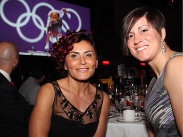 From left, Semiha Cantas, owner of Cantas fashion boutique on Sussex Drive, rubbed elbows with Olympic boxer Mary Spencer at the Gold Medal Plates dinner held at the Shaw Centre on Monday, November 17, 2014.