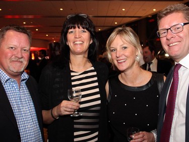 From left, Steve Moffatt and his wife, Tammy, with Kristin Smith and Brian Murray of Sakto Corporation attended the Gold Medal Plates benefit dinner for the Canadian Olympic Foundation, held at the Shaw Centre on Monday, November 17, 2014.