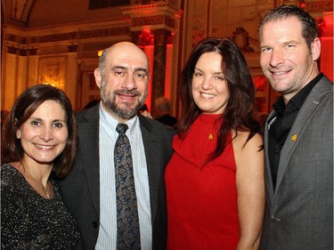 From left, Tassy Vassilyadi and her husband, CHEO physician Michael Vassilyadi, with the CHEO Foundation's Jacqueline Belsito, V-P of philanthropy and community engagement, and Ted Wagstaff at the Trees of Hope for CHEO event held Monday, November 24, 2014.