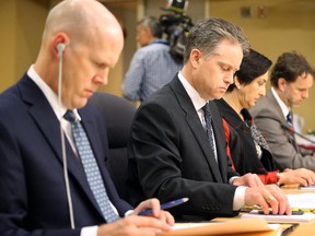 From left: Tom Venner, Assistant Director, Policy and Strategic Partnerships at CSIS; Gary Robertson, Assistant Deputy Minister, National and Cyber Security Branch, Public Safety; and other top officials appear at a Senate committee.