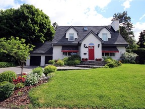 This renovated two-and-a-half-storey at 533 Mansfield Ave. is on a double lot.