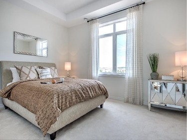 The bedroom in the Acapella is big enough for a queen bed and two dressers and boasts a tray ceiling.