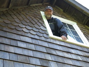 These wood shingles were treated with a one-time wood finishing product to create a dark, even colour. Application is easy with a pump-up weed sprayer.
