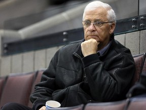 General Manager Bryan Murray is deep in thought as the Ottawa Senators practice at the Canadian Tire Centre in Ottawa, March 19, 2014, .