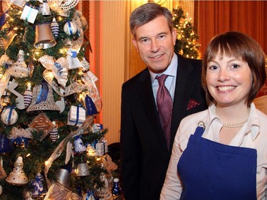 Grant McDonald, managing partner at KPMG, with Meredith Parker and their firm's winning tree at the Trees of Hope for CHEO event held at the Fairmont Chateau Laurier on Monday, November 24, 2014.