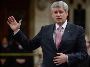 Prime Minister Stephen Harper responds to a question during question period in the House of Commons on Parliament Hill in Ottawa, Wednesday Nov. 19, 2014. THE CANADIAN PRESS/Sean Kilpatrick