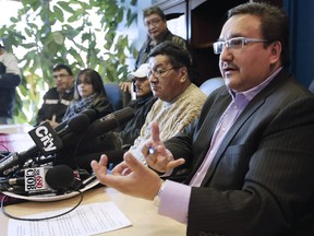 With family members and other chiefs looking on, Grand Chief David Harper speaks at a press conference for Rinelle Harper in Winnipeg Thursday, November 13, 2014. The mother of a 16-year-old who was viciously attacked, sexually assaulted and left for dead in downtown Winnipeg says the teen is getting better and is anxious to return to school.