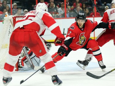 Jared Cowen attempts to block the shot  in the second period.