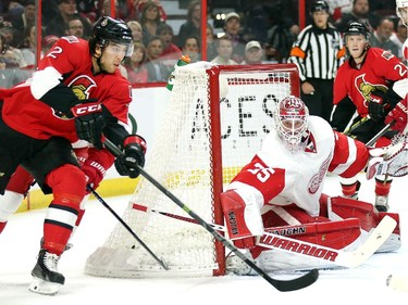 Jared Cowen tries a wrap around shot on goalie Jimmy Howard in the first period.