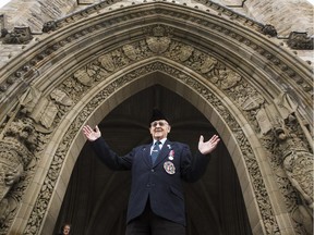 Joseph Bohemier, 93, is photographed outside Parliament after speaking to Kelly Egan about his time spent as a driver for former prime minister Mackenzie King in 1944 Thursday, November 27, 2014. Bohemier has a lifetime pass to the House of Commons and was back with his children for the first time in a long time. (Darren Brown/Ottawa Citizen)