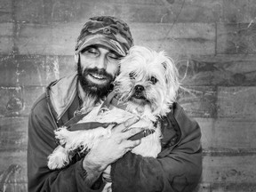 Sandy Sharkey has photographed homeless or low-income people with their pets for the fundraiser Joy To Their World.