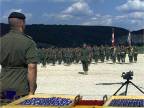 Soldiers of the Third Battallion Princess Patricia's Canadian Light Infantry Battle Group receive a NATO medal in 2000 for service in Bosnia and Herzegovina.