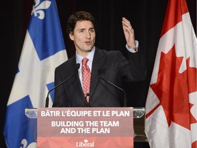 Liberal Leader Justin Trudeau speaks at his nomination meeting in the Montreal riding of Papineau on Saturday. He is still mulling what to do about two Liberal MPs who have been suspended over harassment allegations.