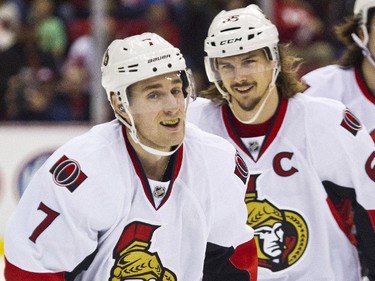 Ottawa Senators forward Kyle Turris (7) skates near defenseman Erik Karlsson, of Sweden, after Turris scored a goal during the first period.