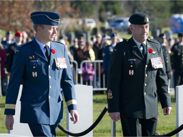From left: Lieutenant-General David Millar and Chief Warrant Officer Pierre Marchand during the Remembrance Day ceremony held at the National Military Cemetery at Beechwood Cemetery Tuesday November 11, 2014.