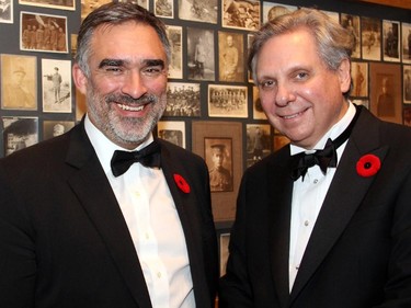 Marc Mayer, director of the National Gallery of Canada, with National Capital Commission (NCC) CEO Mark Kristmanson at a special First World War commemorative evening held at the National Gallery on Monday, Nov. 10, 2014.