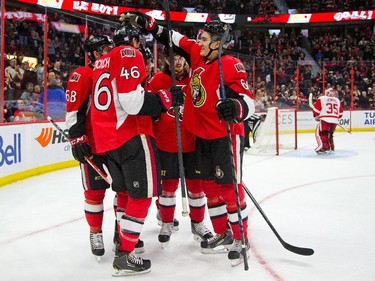 Mark Stone pats Patrick Wiercioch on the head after he scored the game winning goal in the third period.