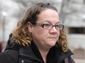 Melissa Schell outside the Elgin St. courthouse in Ottawa, Wednesday, November 12, 2014. Schell is a guard at the Ottawa-Carleton Detention Centre. She is a crown witness in the case against John Barbro, a former guard charged with assault. Mike Carroccetto / Ottawa Citizen