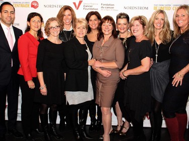 Members of a larger 20-person gala committee pose together at a reception held Wednesday, November 19, 2014, at Lago Bar and Grill to promote Nordstrom's March 4 charity event for the Ottawa Regional Cancer Foundation and United Way Ottawa.