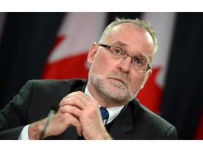 Auditor General of Canada Michael Ferguson speaks to reporters at the National Press Theatre in Ottawa