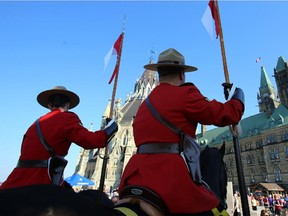 Mounted RCMP officers behind Parliament Hill Sept. 27, 2014.