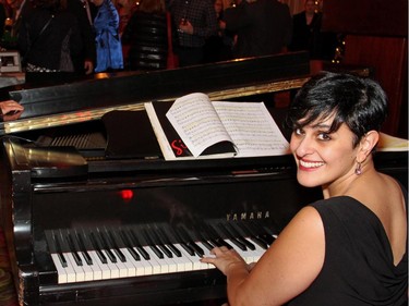 Nathalie Khoriaty tickled the ivories at the Trees of Hope for CHEO event held at the Fairmont Chateau Laurier hotel on Monday, November 24, 2014.