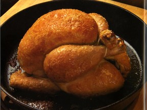 A perfectly roasted chicken, author Michael Ruhlman argues, is so easy, you can pop it in the oven then go off and do something else for an hour.