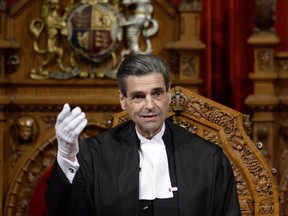 Quebec Sen. Pierre Claude Nolin sits in the Senate chamber in Ottawa, Thursday Nov.27, 2014 after being named the new Speaker of the Senate.