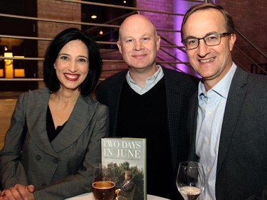 Ottawa Citizen city affairs columnist Joanne Chianello with Ottawa Citizen editor-in-chief Andrew Potter and Chianello's husband, John Geddes, Ottawa bureau chief for Maclean's, at the launch of Andrew Cohen's book, Two Days in June: John F. Kennedy and the 48 Hours that Made History.
