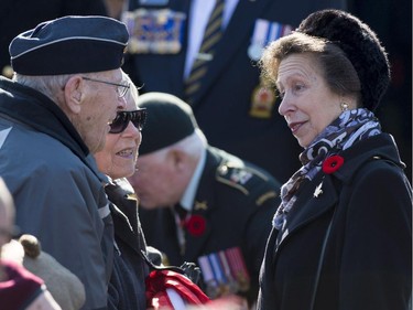 Princess Anne speaks to veterans following the Remembrance Day ceremony at the National War Memorial in Ottawa on Tuesday, Nov. 11, 2014.