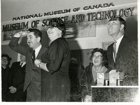 Resources minister Jean-Luc Pepin and secretary of state Judy Lamarsh with museum director David Baird, far right, watch fireworks at the museum opening on November 16, 1967; Canadian Museum of Science and Technology
