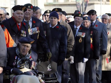 Second World War Veteran Fred Arsenault, bottom left, 94, waits in the parade line at the Remembrance Day ceremony at the National War Memorial in Ottawa on Tuesday, November 11, 2014.