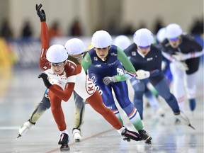 Canada's Ivanie Blondin  leads the pack in the women's mass start Division A at the ISU World Cup Speed Skating competition in Obihiro on Nov. 16, 2014.