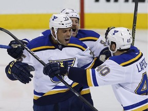 St. Louis Blues' Ryan Reaves (75),  says he hopes people will come to the rink to foget all the tension in Ferguson.