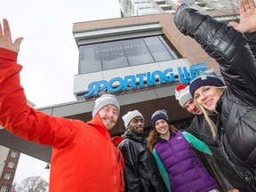 Staff from Sporting Life at Lansdowne Park sport City of Neighbourhood toques by Tuck Shop Trading Co. Alan Ogilvie, from left, Anselne Motcho, Deanna Bralten, Tom Macdonald, and Edyta Liszkowski, wear toques that celebrate the neighbourhoods of Ottawa.