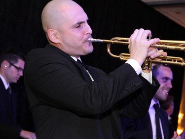 Sway Band member Fred Pachi on trumpet performed at the Queensway Carleton Hospital's major fundraising gala, Mangia! Mangia!, held Saturday, Nov. 8, 2014, at the Sala San Marco banquet hall.