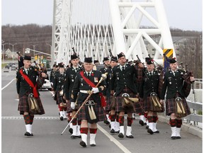 The Cameron Highlanders march during a special ceremony to commemorate the naming of Vimy Memorial Bridge, formerly the Strandherd-Armstrong Bridge in Ottawa.