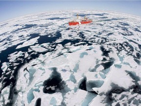This file photo shows the Canadian Coast Guard icebreaker Louis S. St-Laurent making its way through the ice in Baffin Bay on July 10, 2008.