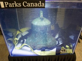 The ship's bell from the recently discovered Franklin Expedition shipwreck HMS Erebus sits in pure water after being recovered in Ottawa on Thursday, Nov. 6, 2014. The shipwreck from the famed expedition in search of the Northwest Passage was found during the 2014 Victoria Strait Expedition.