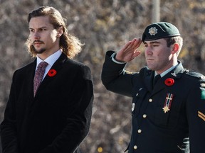 The Toronto Maple Leafs and Ottawa Senators gather together at the National War Memorial in memory of our fallen soldiers.