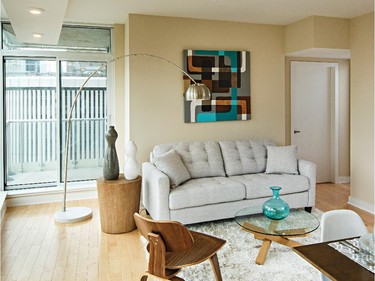 Blond hardwood flooring sets a light tone for the rest of the Broadway unit.