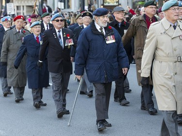 Veterans make their up Elgin Street as the annual Remembrance Day Ceremony takes place at the National War Memorial in Ottawa.