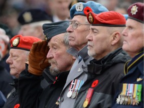 Veterans take part in the Remembrance Day ceremony at the National War Memorial in Ottawa on Nov. 11, 2013.