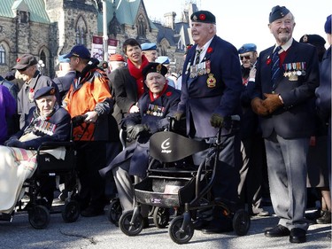 Veterans wait in the parade line at the Remembrance Day ceremony at the National War Memorial in Ottawa on Tuesday, November 11, 2014.