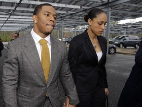In this Thursday, May 1, 2014 file photograph, former Rutgers University and Baltimore Ravens star football player, Ray Rice holds hands with his wife Janay Palmer as they arrive at Atlantic County Criminal Courthouse in Mays Landing, N.J. (AP Photo/Mel Evans,file)