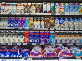 Milk on display in a variety of packaging at Farm Boy on Richmond Road.